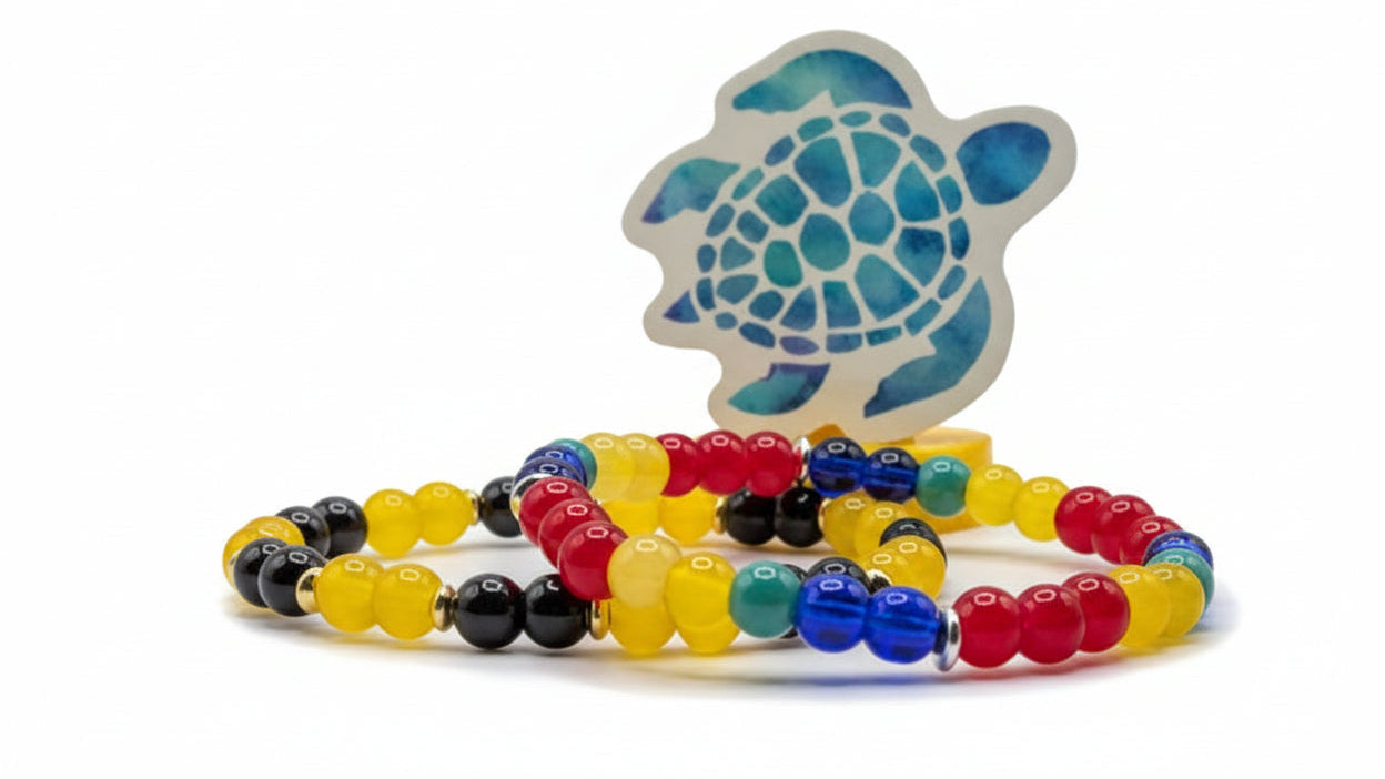 Wildlife inspired beaded bracelets featuring vibrant colors of butterflies birds and bees handmade by Crafty Queens