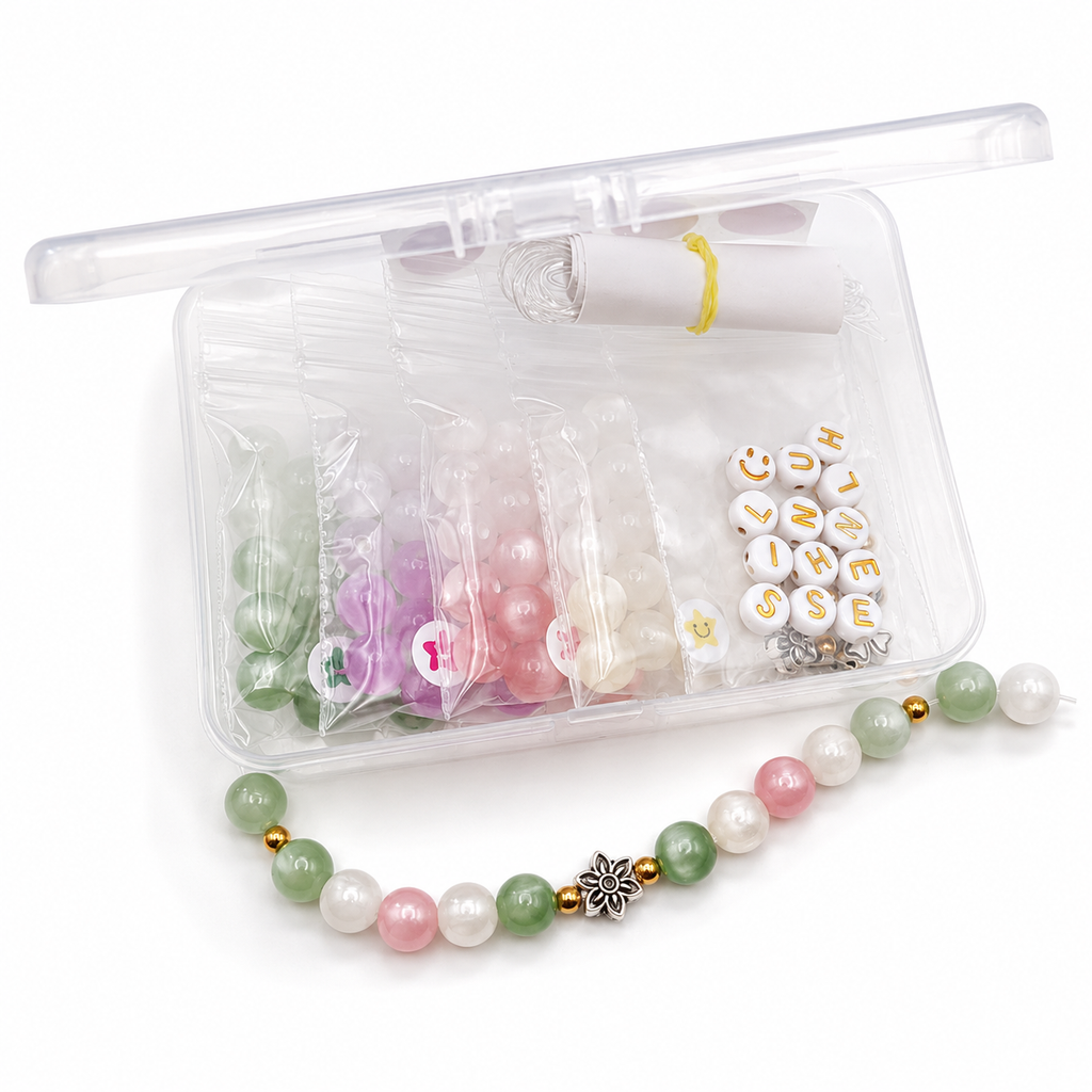Hidden Hues bracelet kit with UV-reactive cat's eye beads, letter beads, floral accents, and bracelet-making supplies