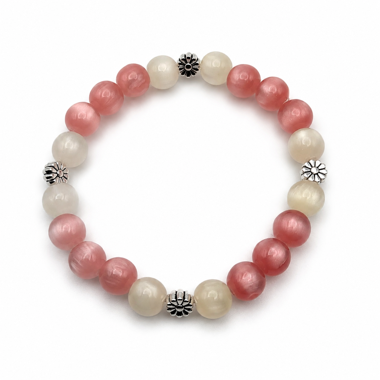 UV color changing bracelet with photochromic cat’s eye beads that transform from cream tones to blush pink and yellow hues in sunlight, featuring daisy-inspired metal spacers and stretch cord