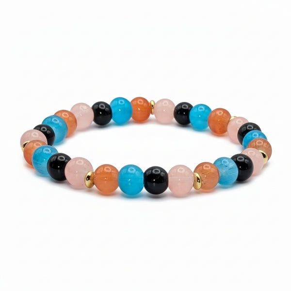 Urban Dawn blue orange pink black glass bead bracelet with golden spacers handmade by Crafty Queens