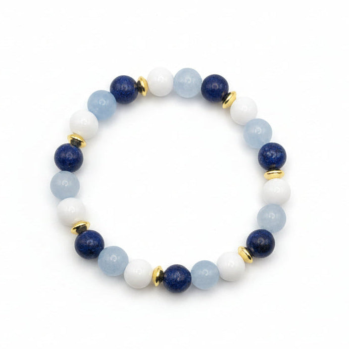 8mm lapis lazuli, aquamarine, and white agate natural gemstone beaded bracelet with golden spacers handmade by Crafty Queens