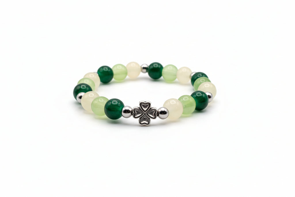 8mm green and ivory glass beaded bracelet with silver spacers and four-leaf clover charm handmade by Crafty Queens