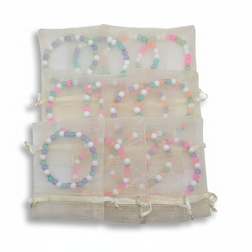 Twelve pastel handmade beaded bracelets individually packaged in cream organza gift bags, 6mm glass bead stretch bracelets party favors for girls and tweens