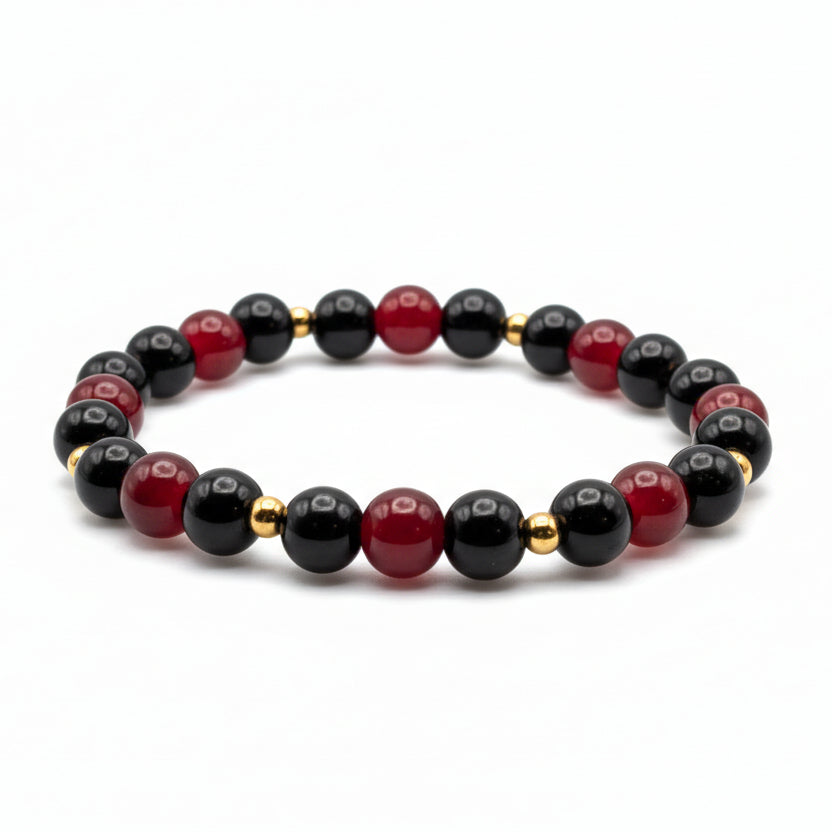 8mm red and black glass bead bracelet with gold stainless steel spacer beads, stretch bracelet with polished shine for everyday wear