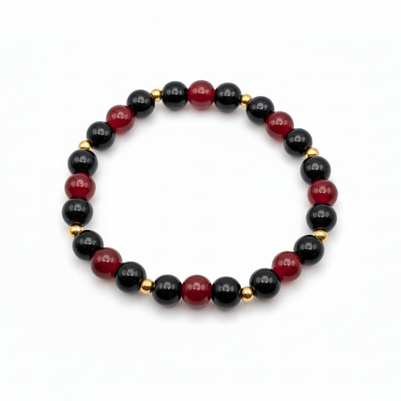 8mm red and black glass bead bracelet with gold stainless steel spacer beads, stretch bracelet with polished shine for everyday wear
