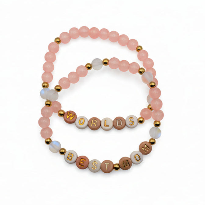 set of 2 coral and white beaded bracelets with letter beads spelling worlds best mom, stretch bracelet set gift for mom