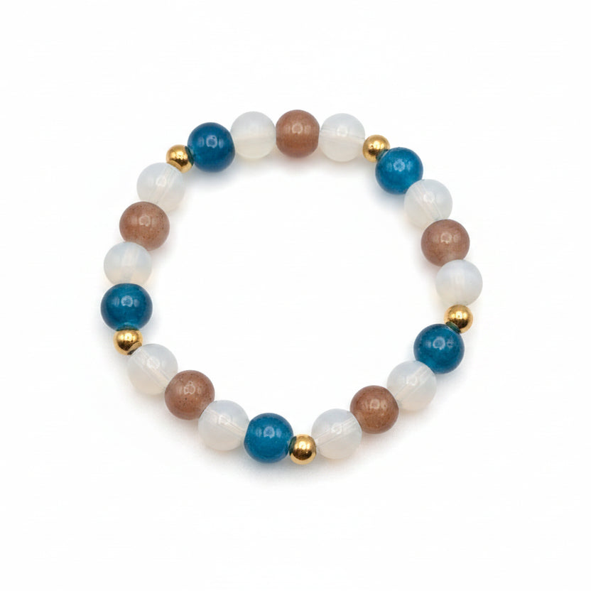 Coral Coast 8mm glass bead stretch bracelet with blue, coral and opalescent beads and golden stainless steel spacers